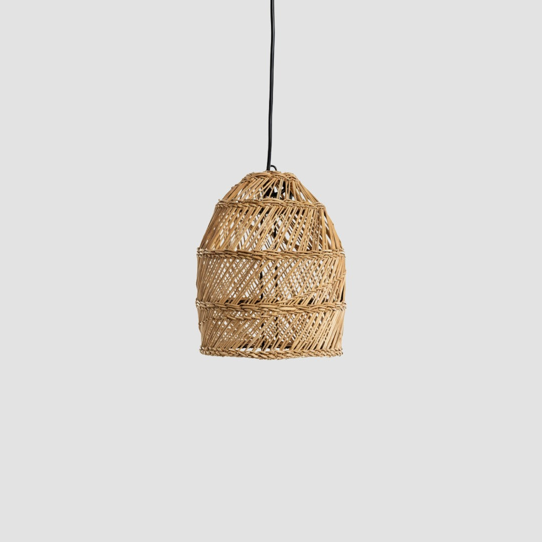Woven seagrass pendant light on a plain background